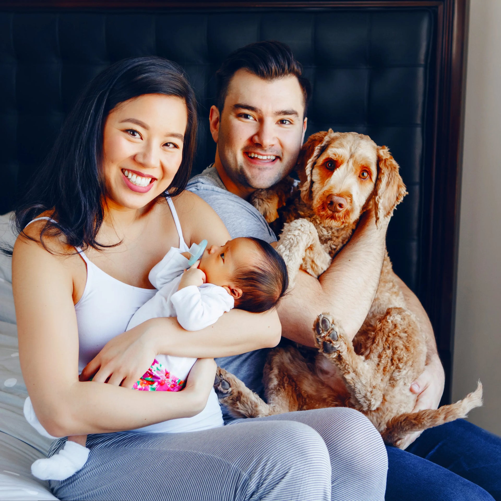 Family with baby and dog.